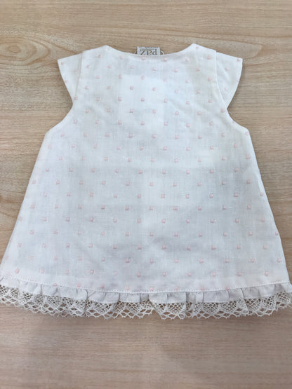 Abito Paz Rodriguez in cotone smanicato con pois rosa con rusche e bottoni trasversali con fiocco