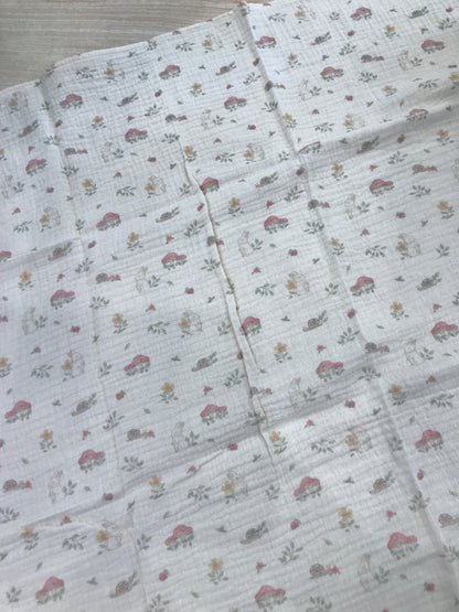 Mussola Baby Gi in garza beige con piccoli animaletti