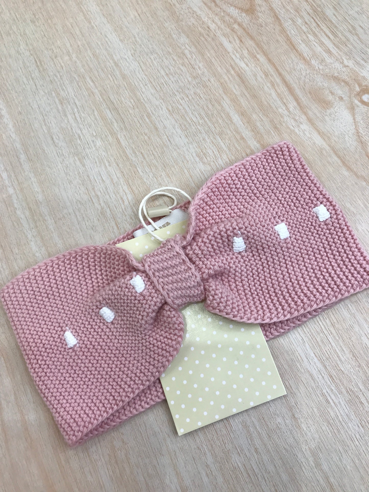 Fascia PCS in filo rosa con nodino e pois bianchi sul davanti