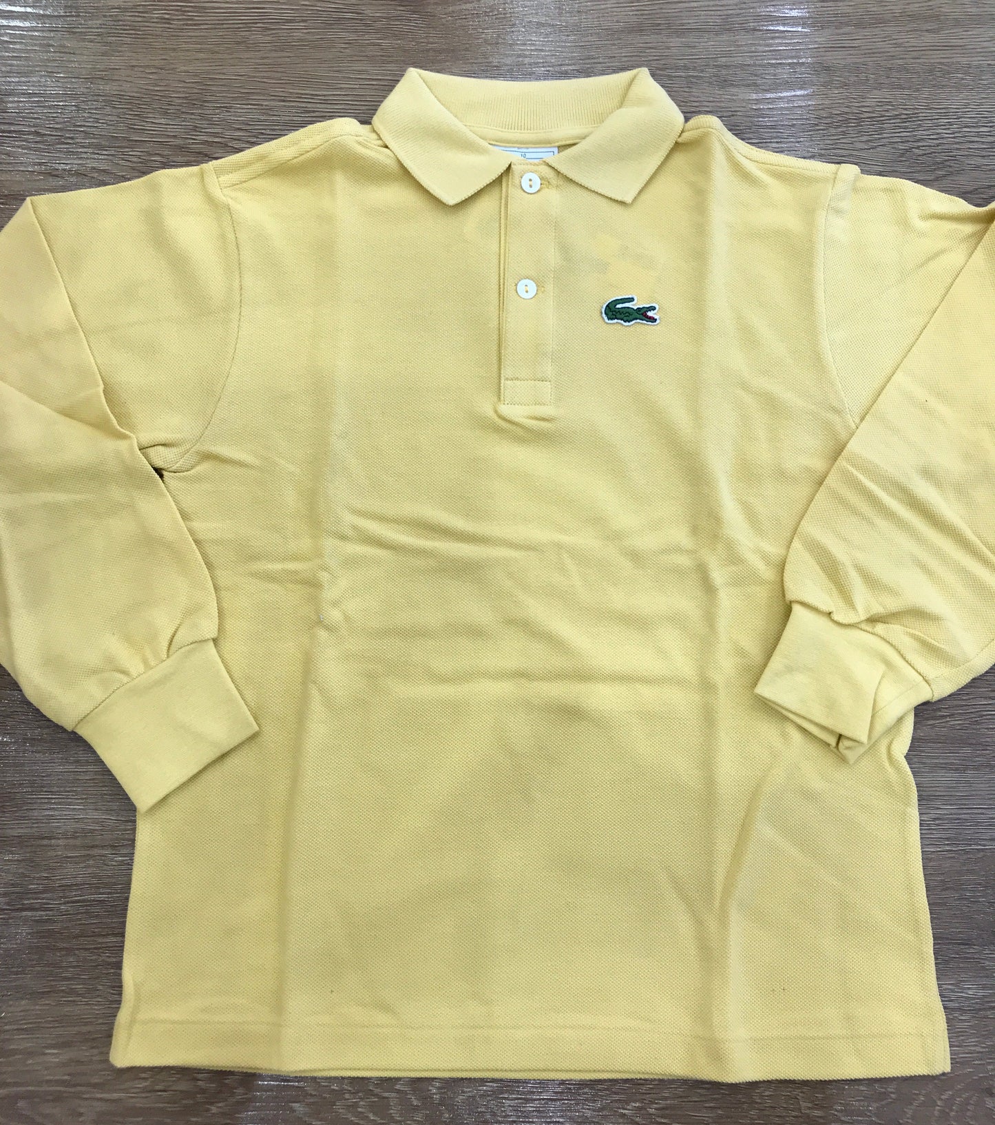 Polo Lacoste manica lunga con polsini e bottoncini