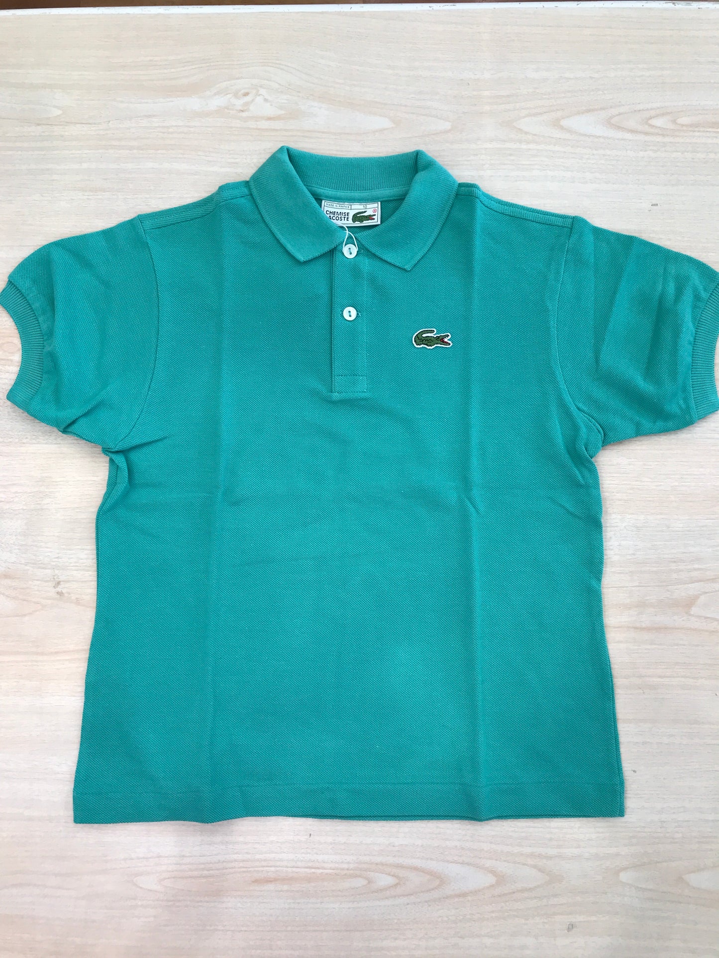 Polo Lacoste in cotone mezza manica con bottoncini e logo ricamato lateralmente unisex