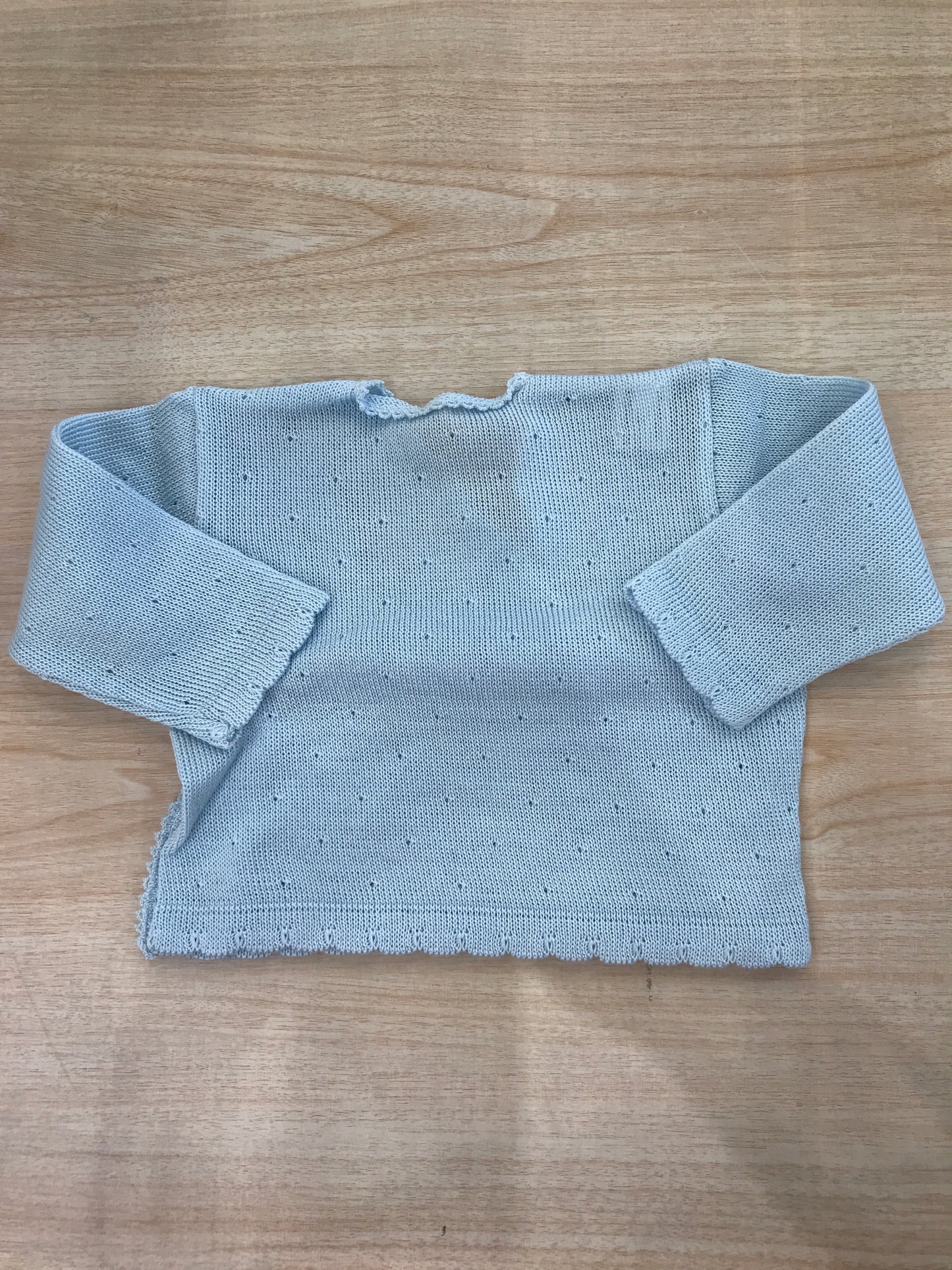 Cardigan Baby Lord in filo celeste ad incrocio bucherellato