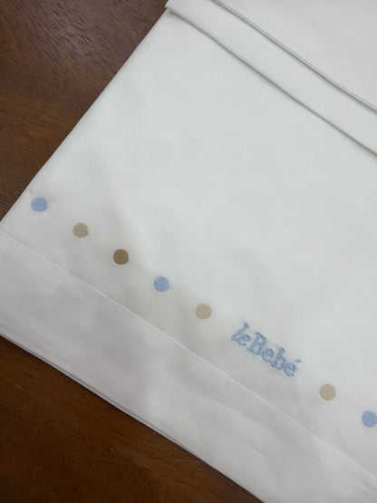 Lenzuolino Le Bebè in cotone con pois ricamati sul davanti