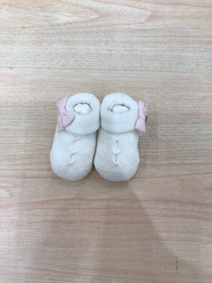 Babbucce Baby Lord in filo bianche con punto smock rosa con fiocchetto laterale