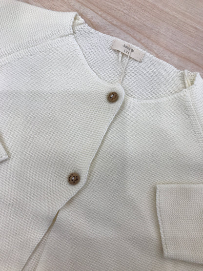 Cardigan Baby Lord in filo panna manica lunga con due piccoli bottoncini sul davanti