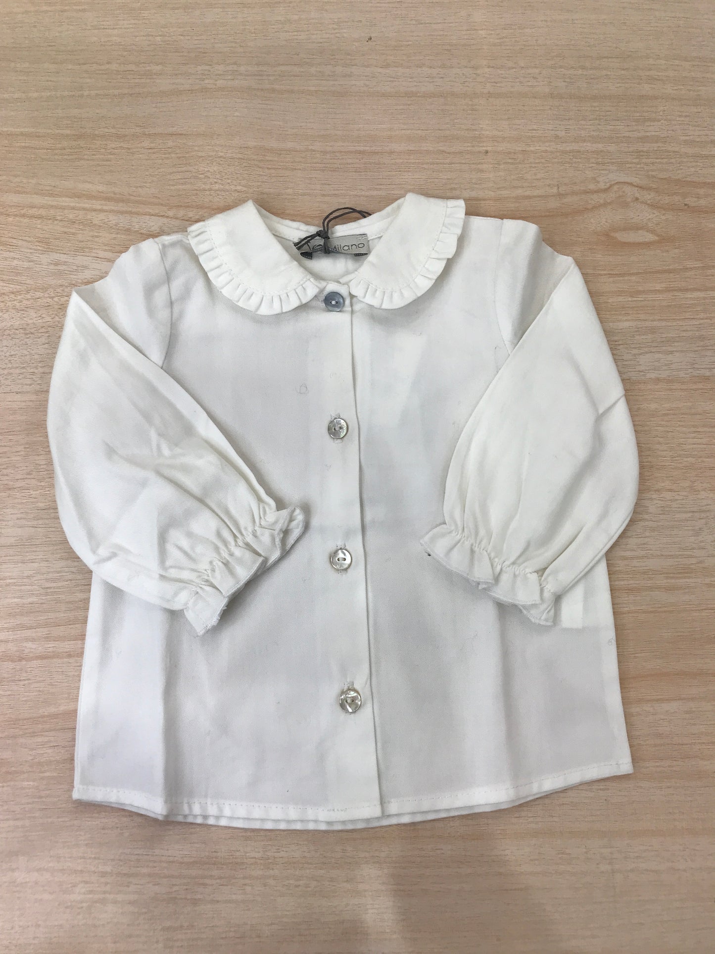 Camicia Jo Milano manica lunga di cotone bianco con manica a sbuffo con colletto con rusche