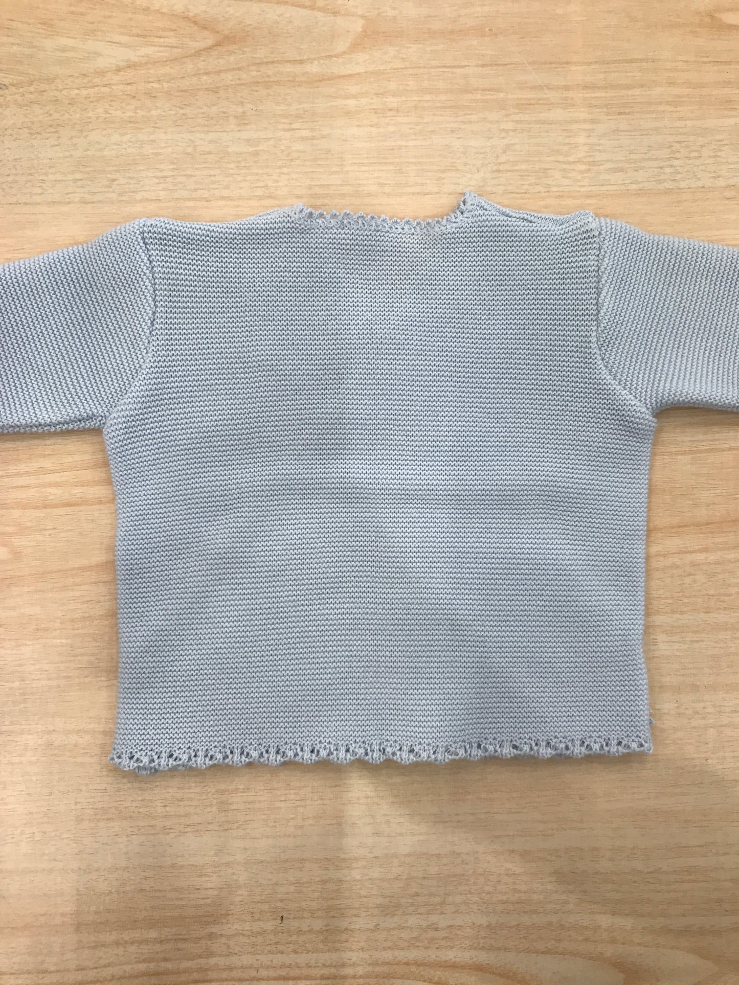 Cardigan Baby Lord in filo celeste ad incrocio smerlato