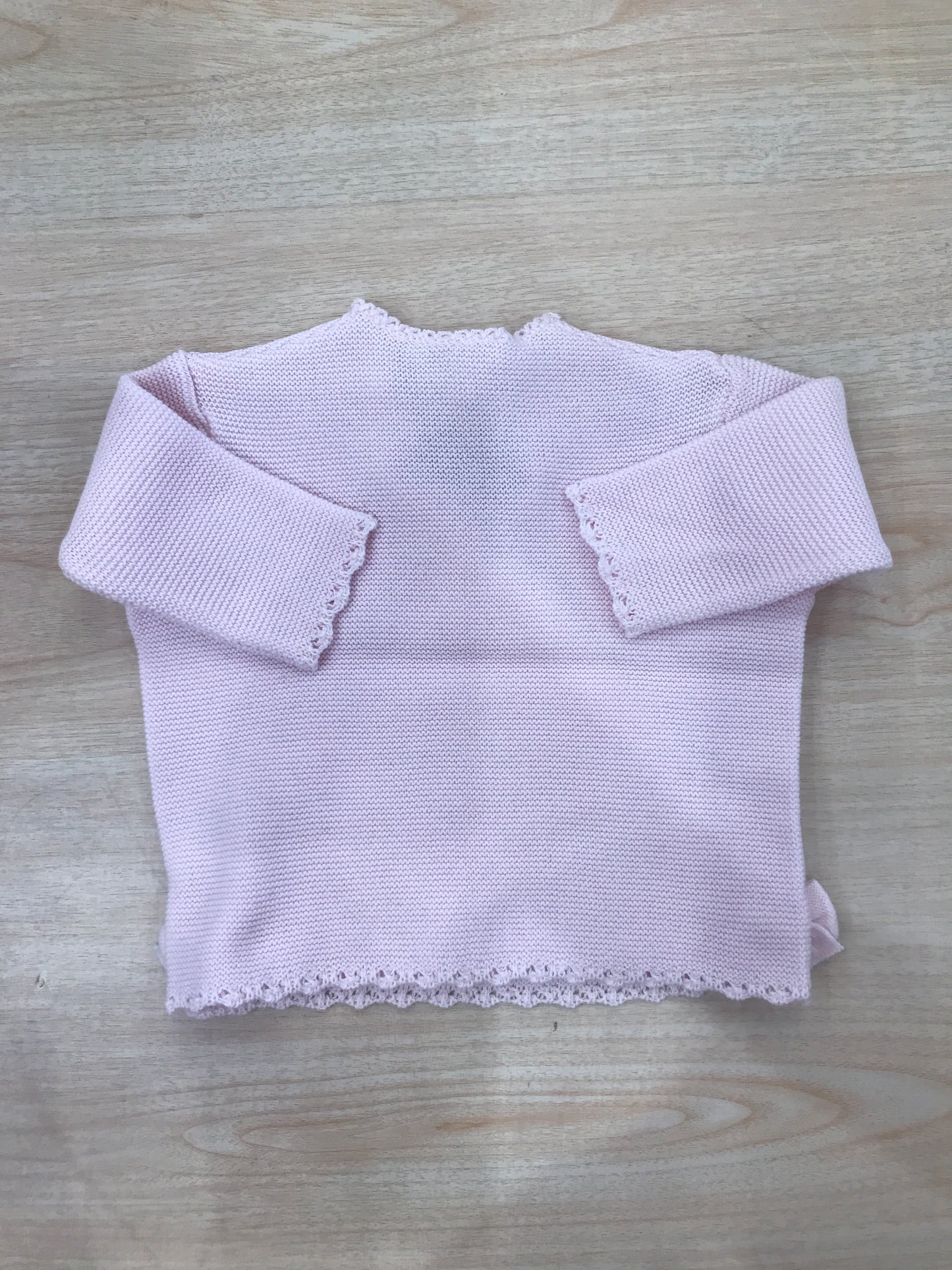 Cardigan Baby Lord in filo rosa chiusura ad incrocio con fiocchetti ai due lati