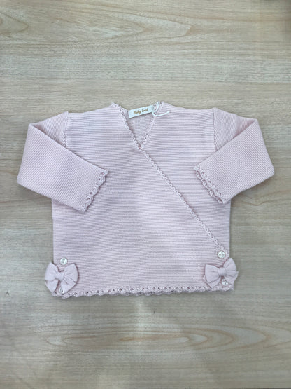 Cardigan Baby Lord in filo rosa chiusura ad incrocio con fiocchetti ai due lati
