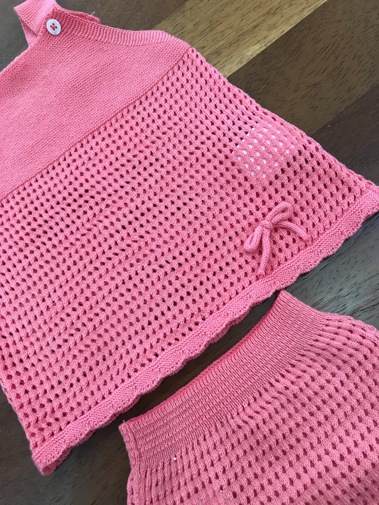 Completo PCS in filo due pezzi traforato color corallo con bretelle e fiocchetto laterale in basso