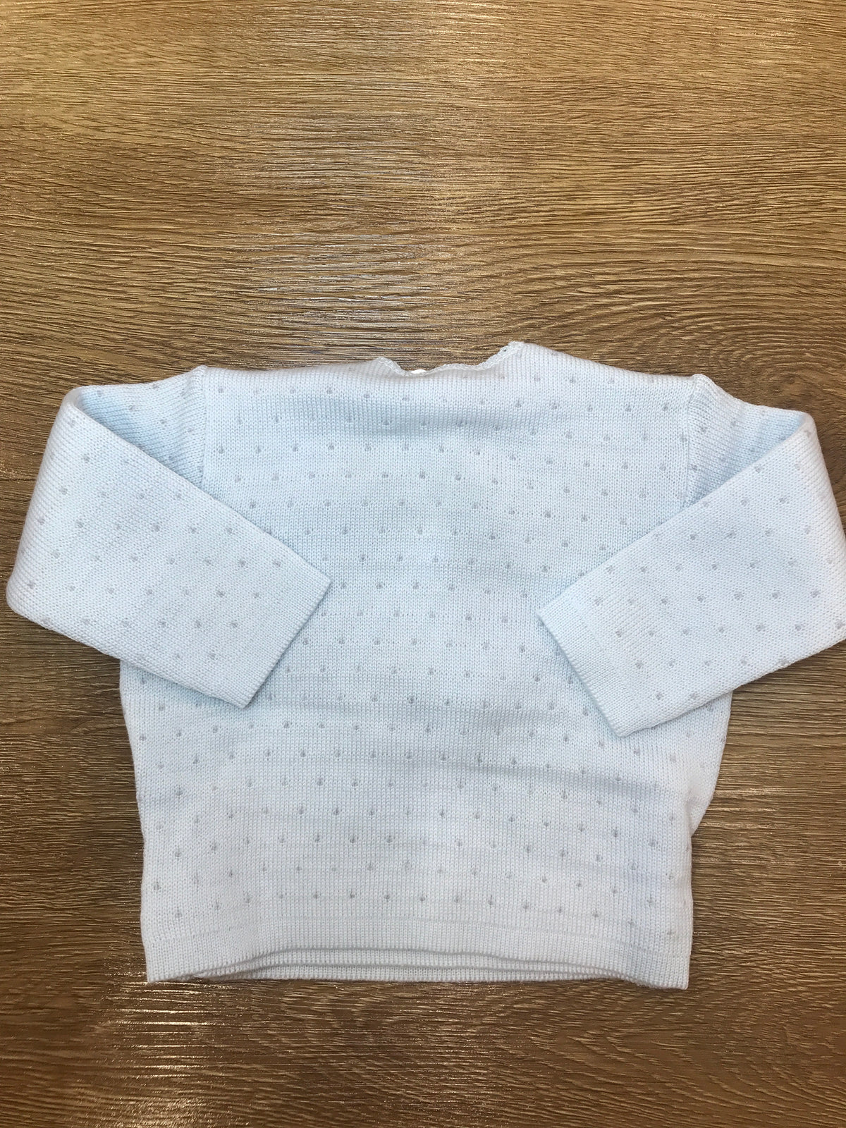 Cardigan Baby Lord in lana ad incrocio celeste con pois grigi