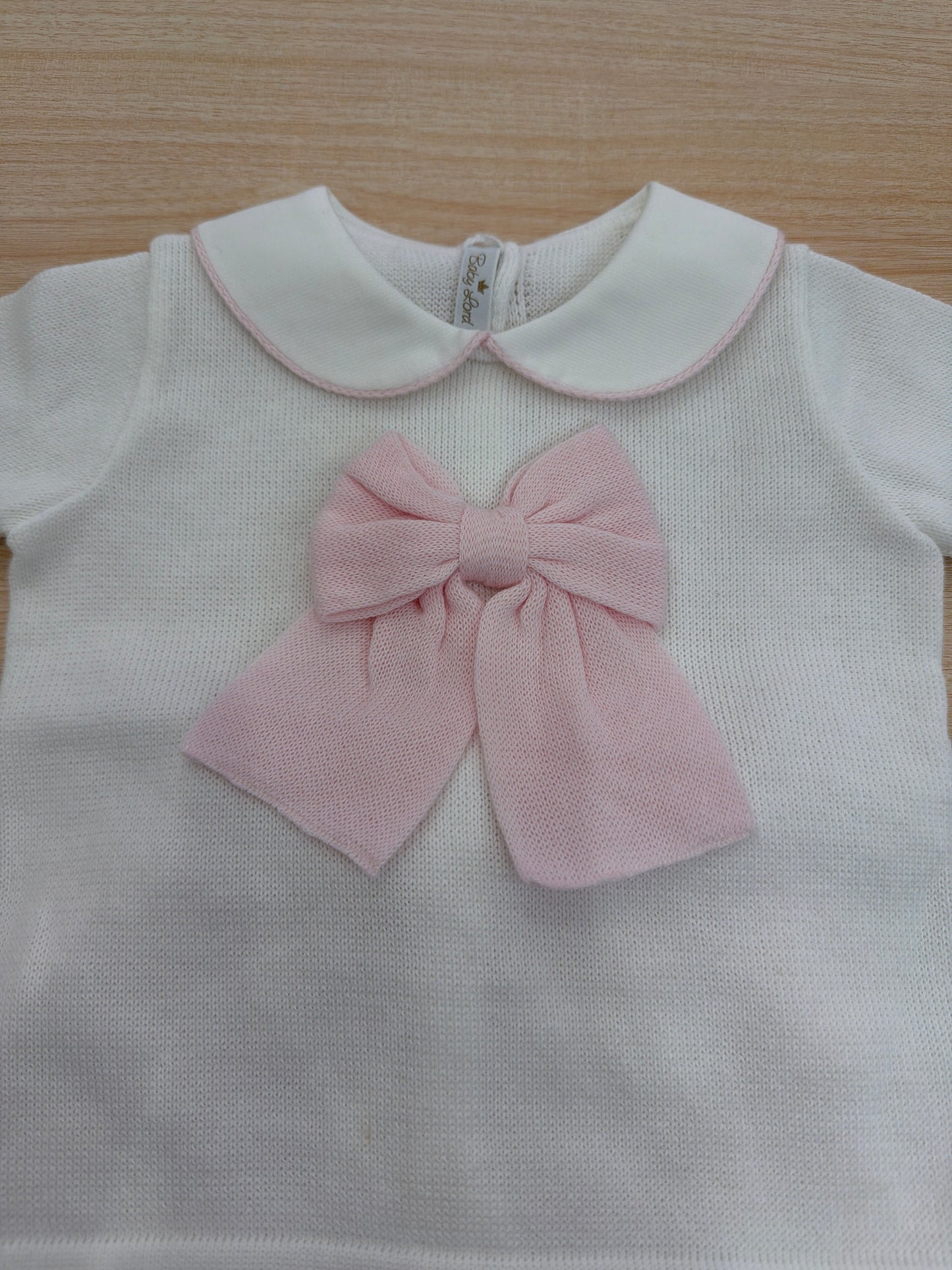 Completo Baby Lord in filo bianco mezza manica con fiocco centrale con gonna rosa plissettata