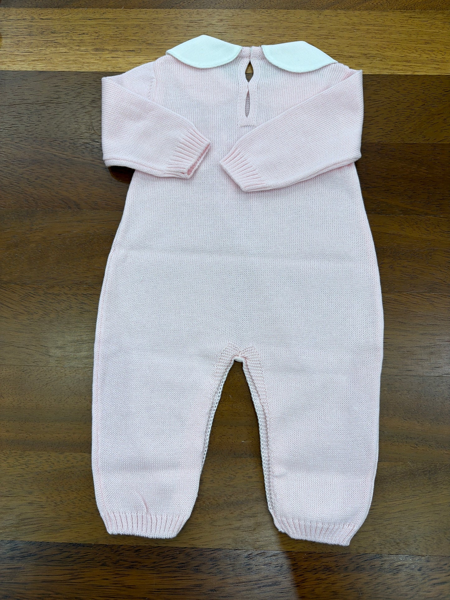 Tutina Baby Lord in filo manica lunga rosa con lavorazione di punto smock bianco