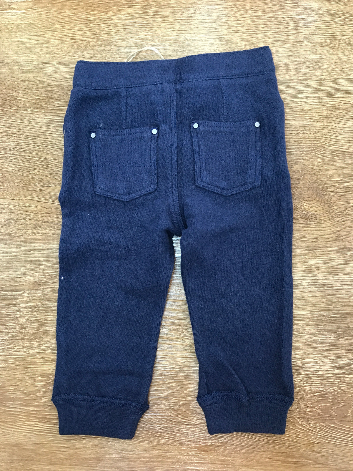 Tuta Maperò due pezzi blu scuro con righe beige