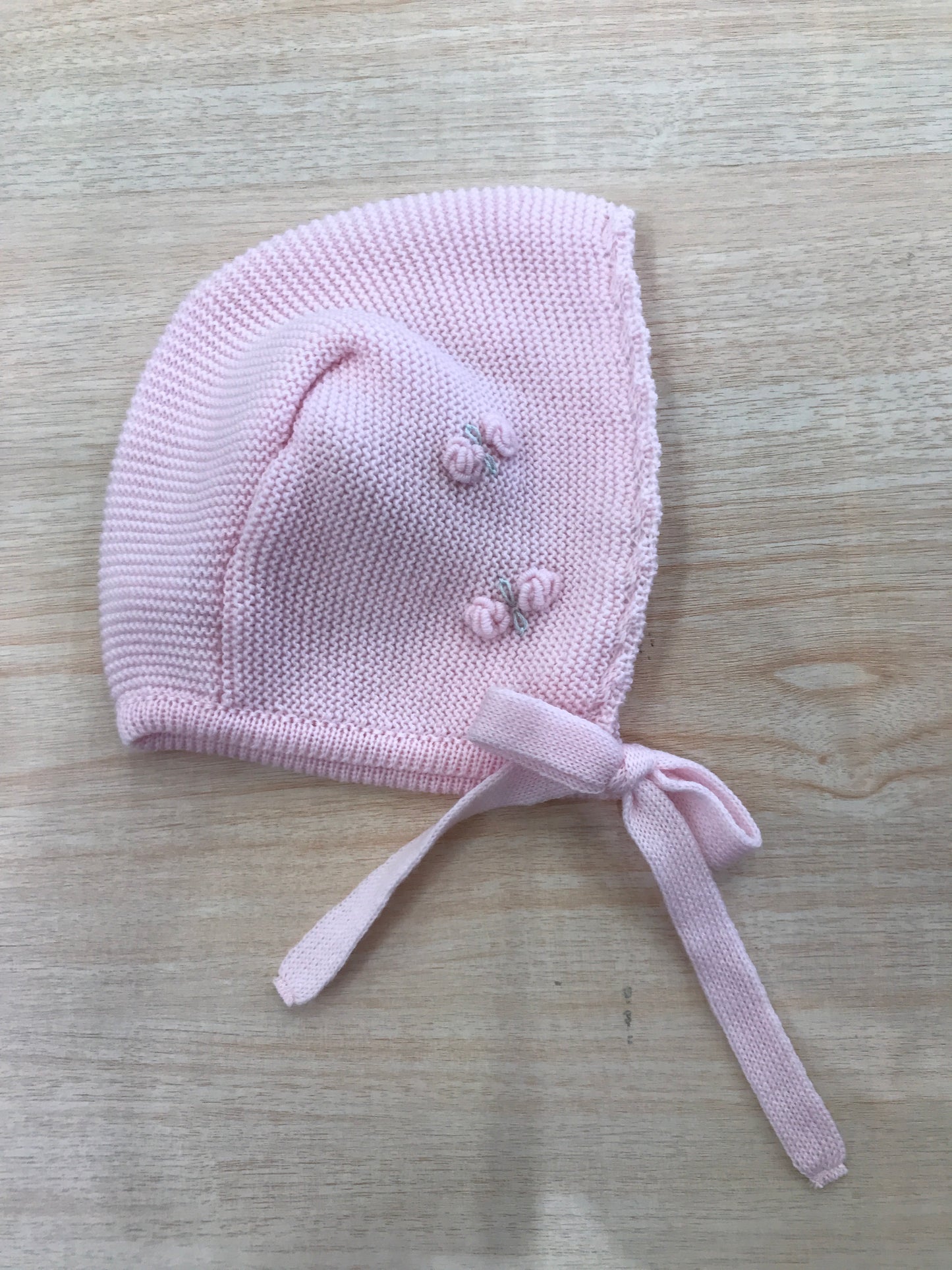Cuffia Baby Lord in lana con rose rosa ricamate