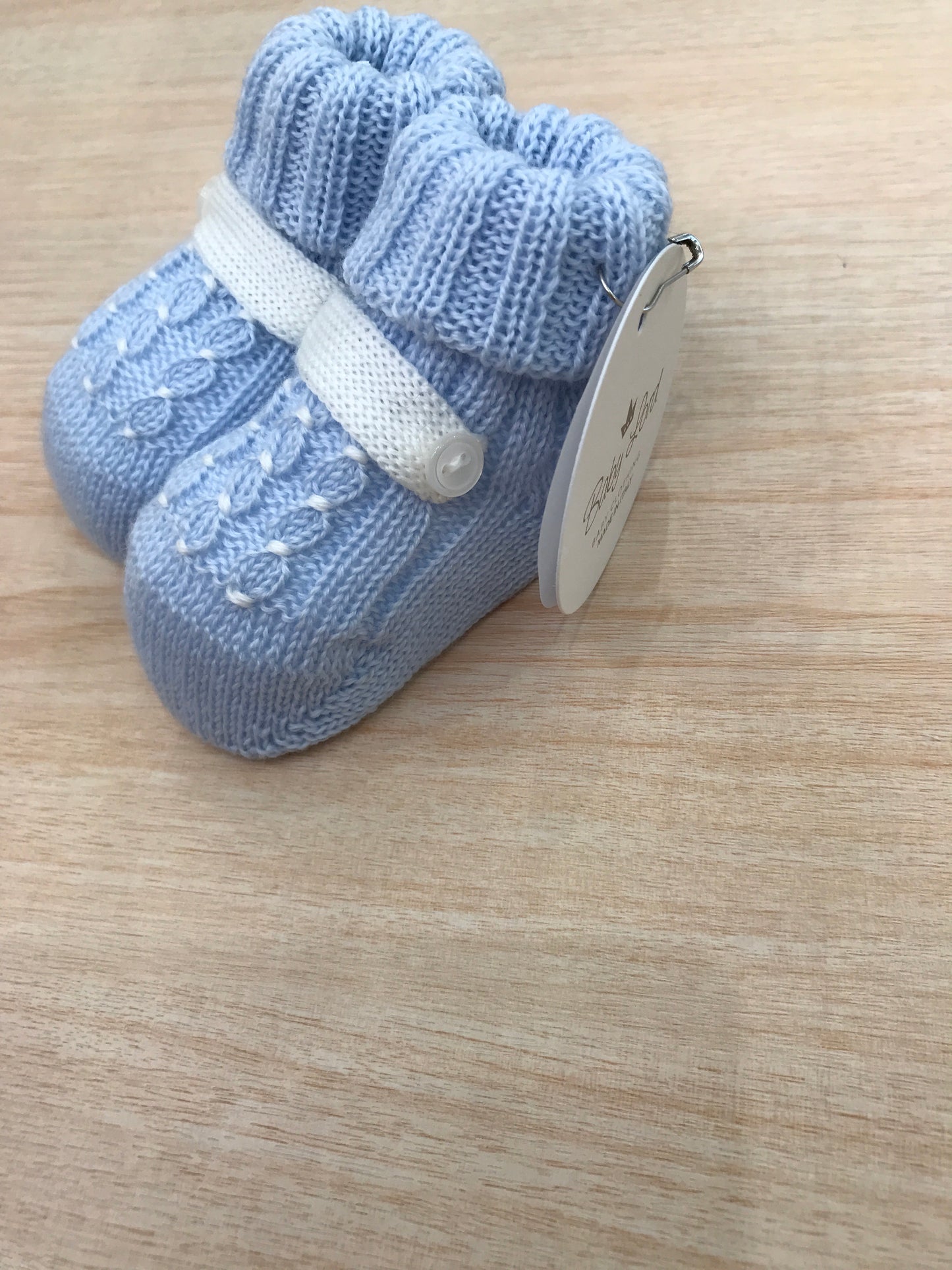 Babbucce Baby Lord in lana celeste con lavorazione di punto smock panna