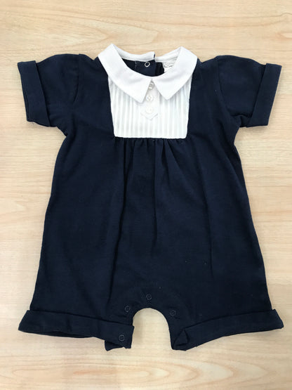 Pagliaccetto Coccodè in cotone blu scuro con dettaglio bianco e colletto a punta