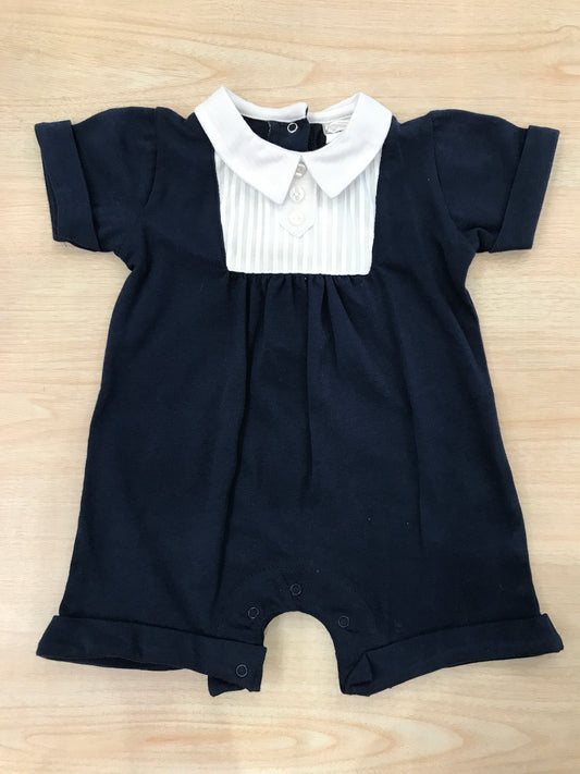 Pagliaccetto Coccodè in cotone blu scuro con dettaglio bianco e colletto a punta