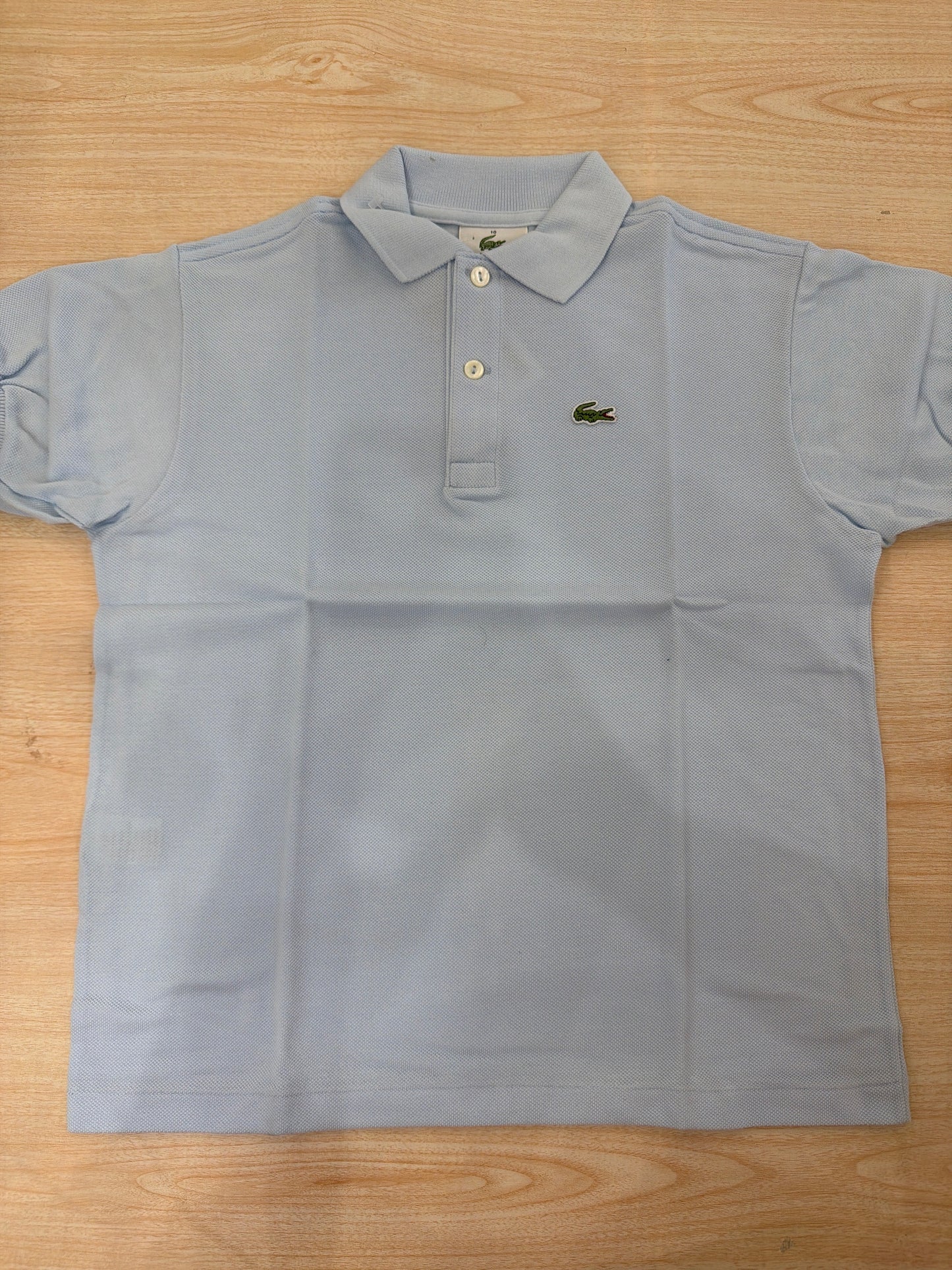 Polo Lacoste in cotone mezza manica con bottoncini e logo ricamato lateralmente unisex