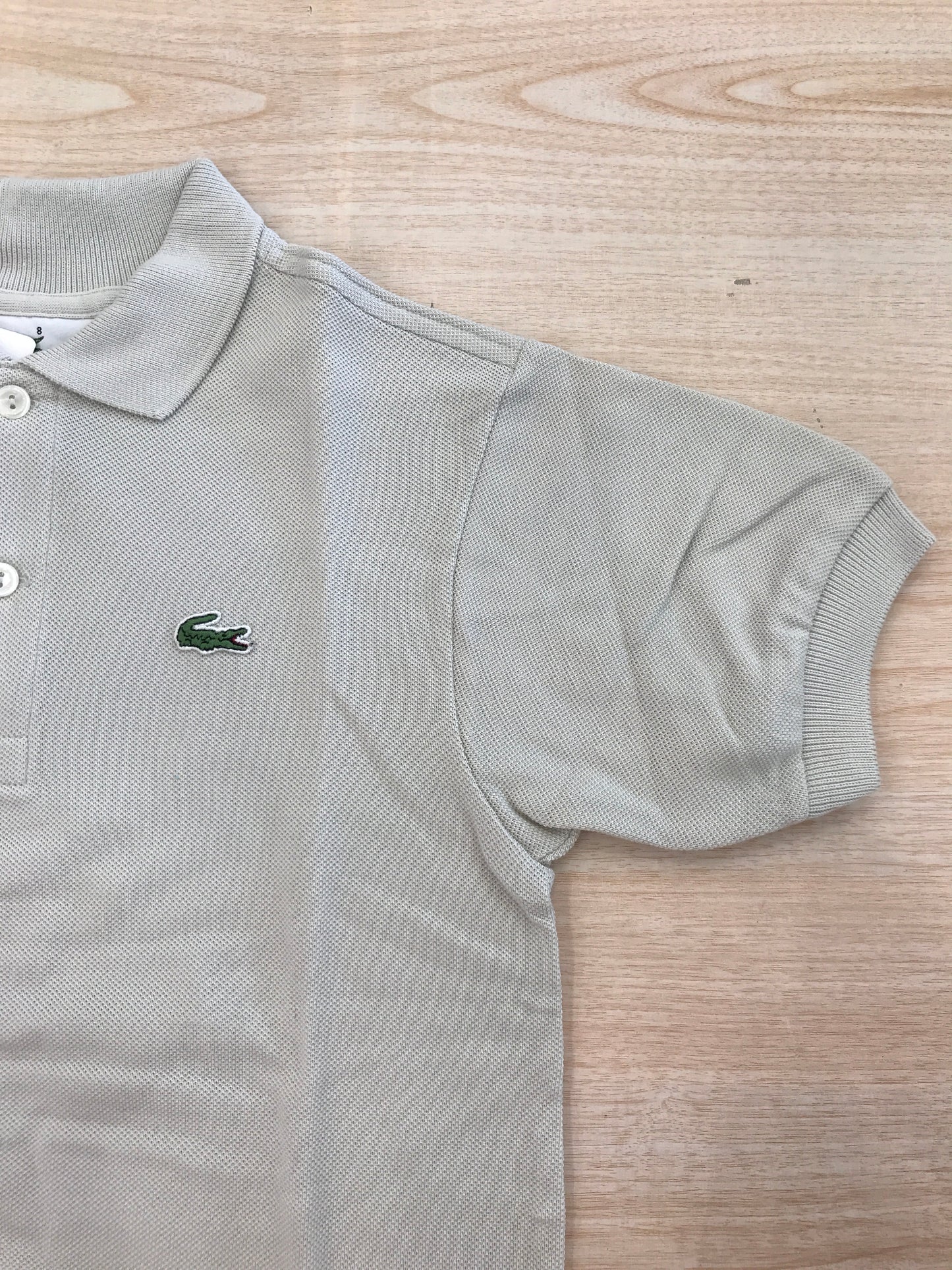 Polo Lacoste in cotone mezza manica con bottoncini e logo ricamato lateralmente unisex