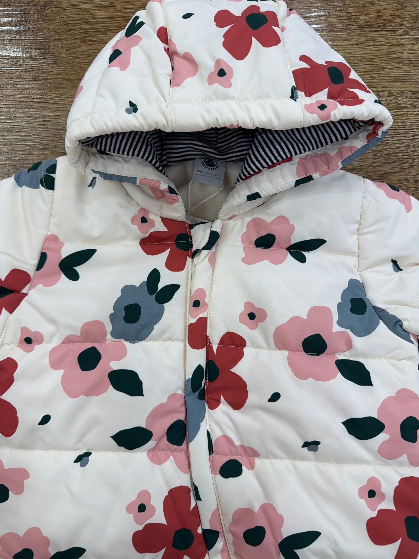 Eskimo Petit Bateau intero impermeabile imbottino con chiusura trasversale con cappuccio e decorato da fiorellini