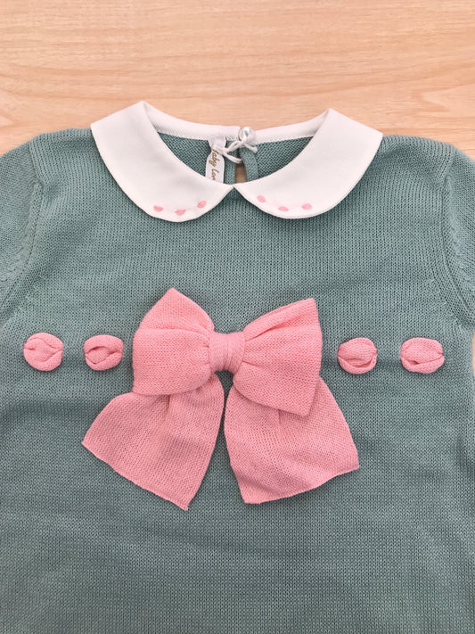 Pagliaccetto Baby Lord in filo verde con fiocco rosa centrale con collo bianco con pois rosa