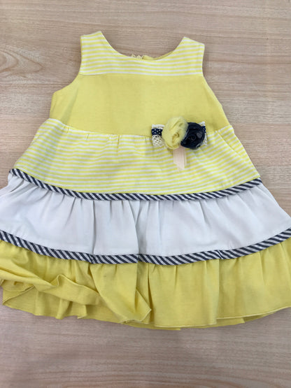 Abito Diva in cotone smanicato giallo con rusche in bianco giallo chiaro con fiori