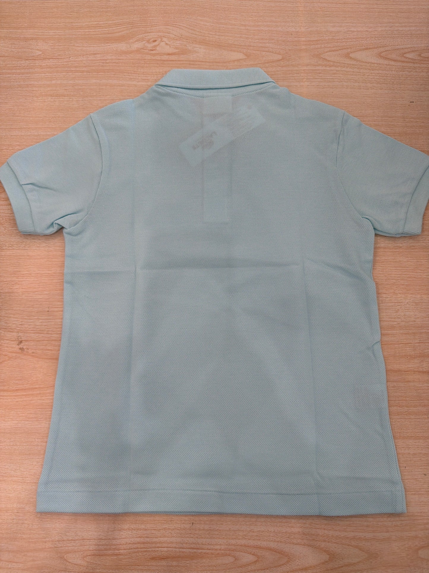 Polo Lacoste in cotone mezza manica con bottoncini e logo ricamato lateralmente unisex