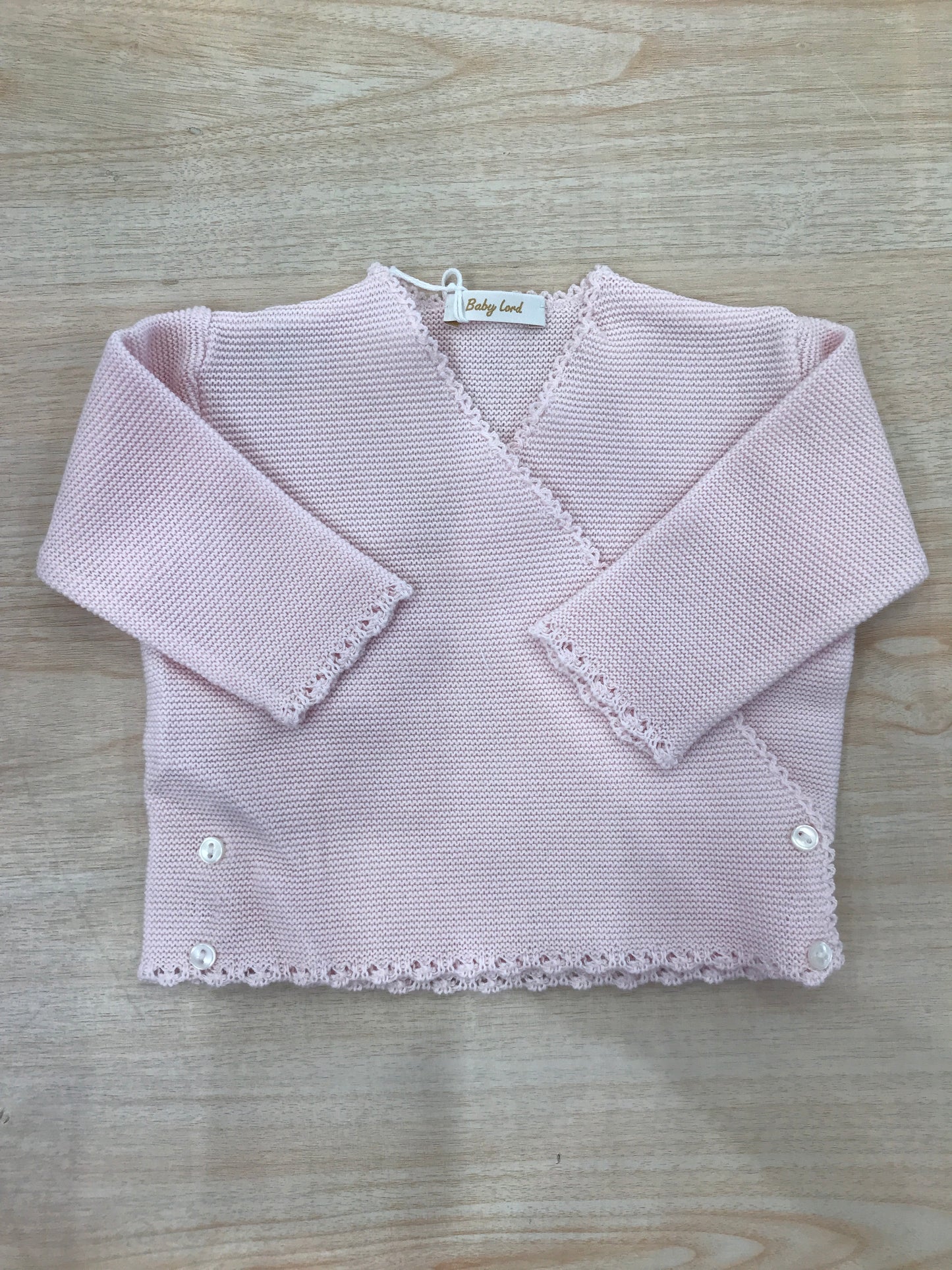 Cardigan Baby Lord in filo rosa ad incrocio