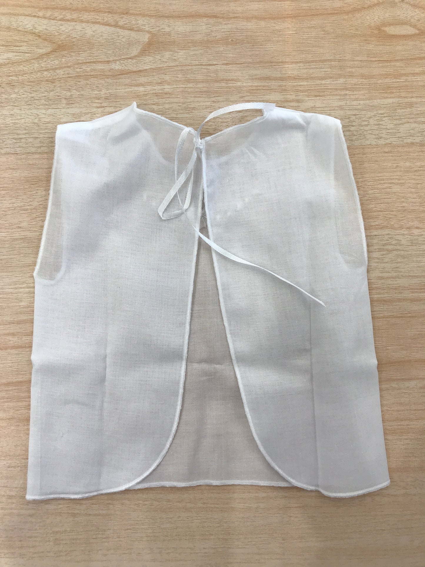 Camicino Baby gi in cotone bianco smanicato con pois e fiocchetto bianco ricamato sul davanti