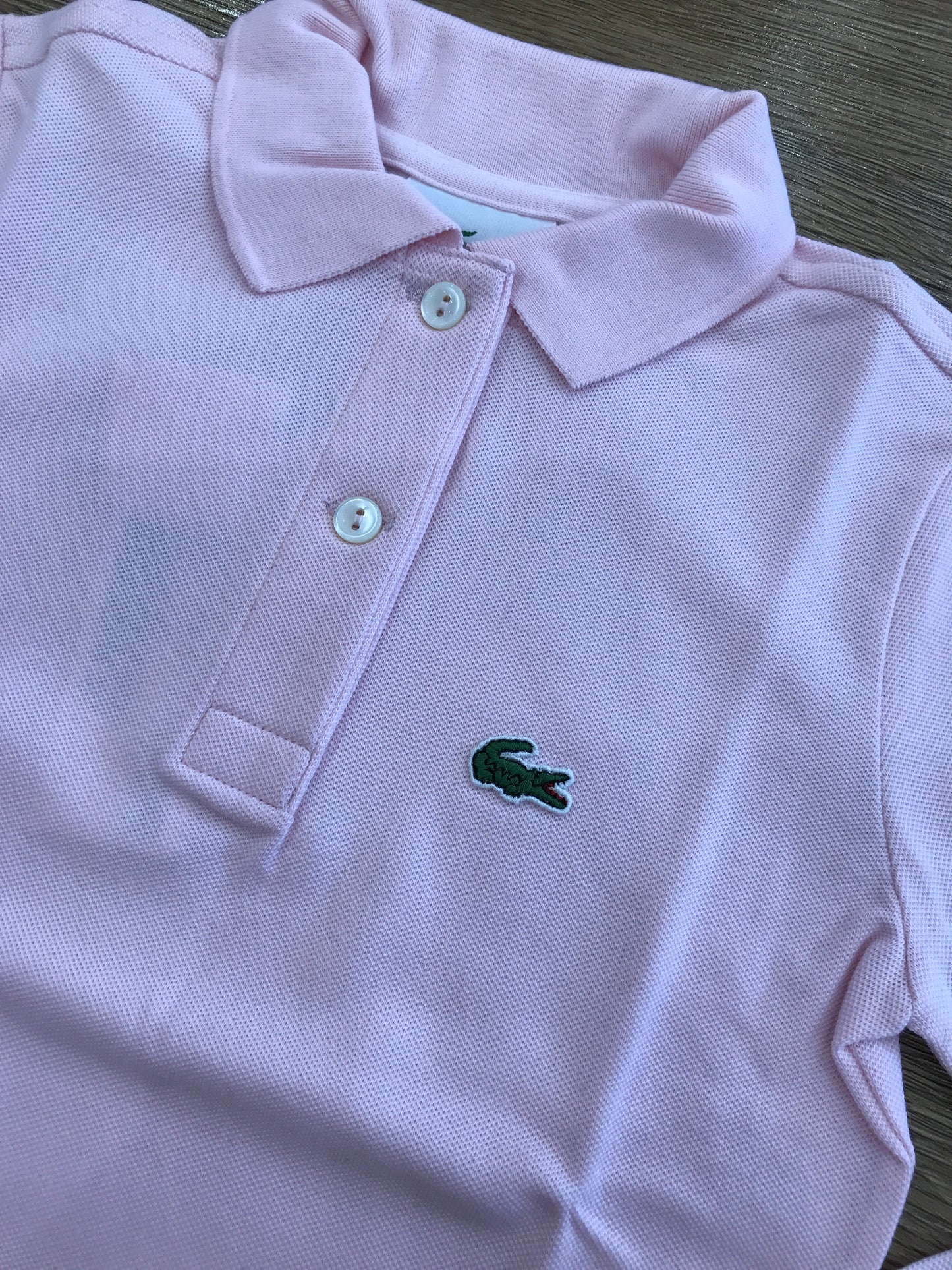 Polo Lacoste manica lunga con polsini e bottoncini