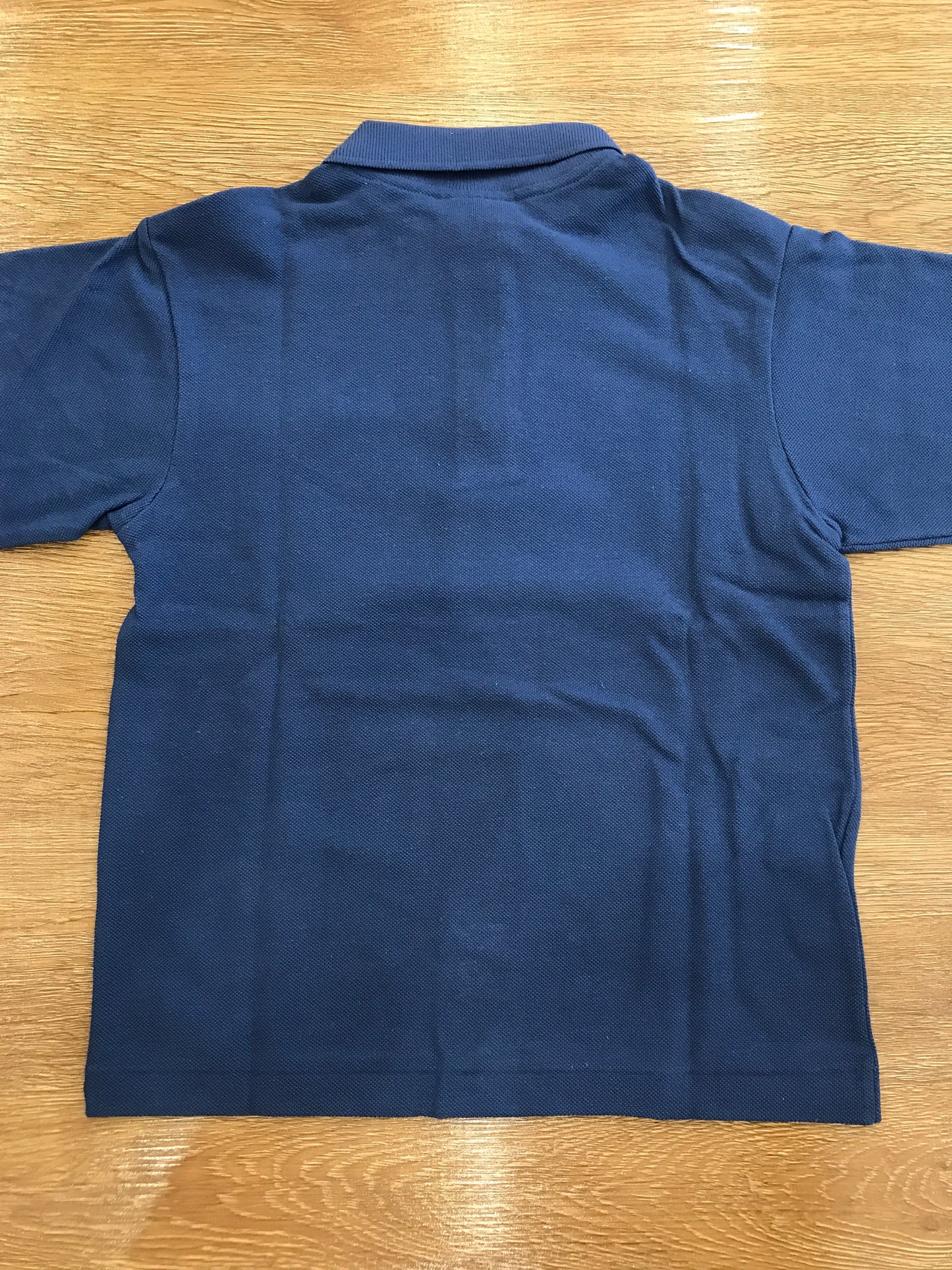 Polo Lacoste manica lunga con polsini e bottoncini