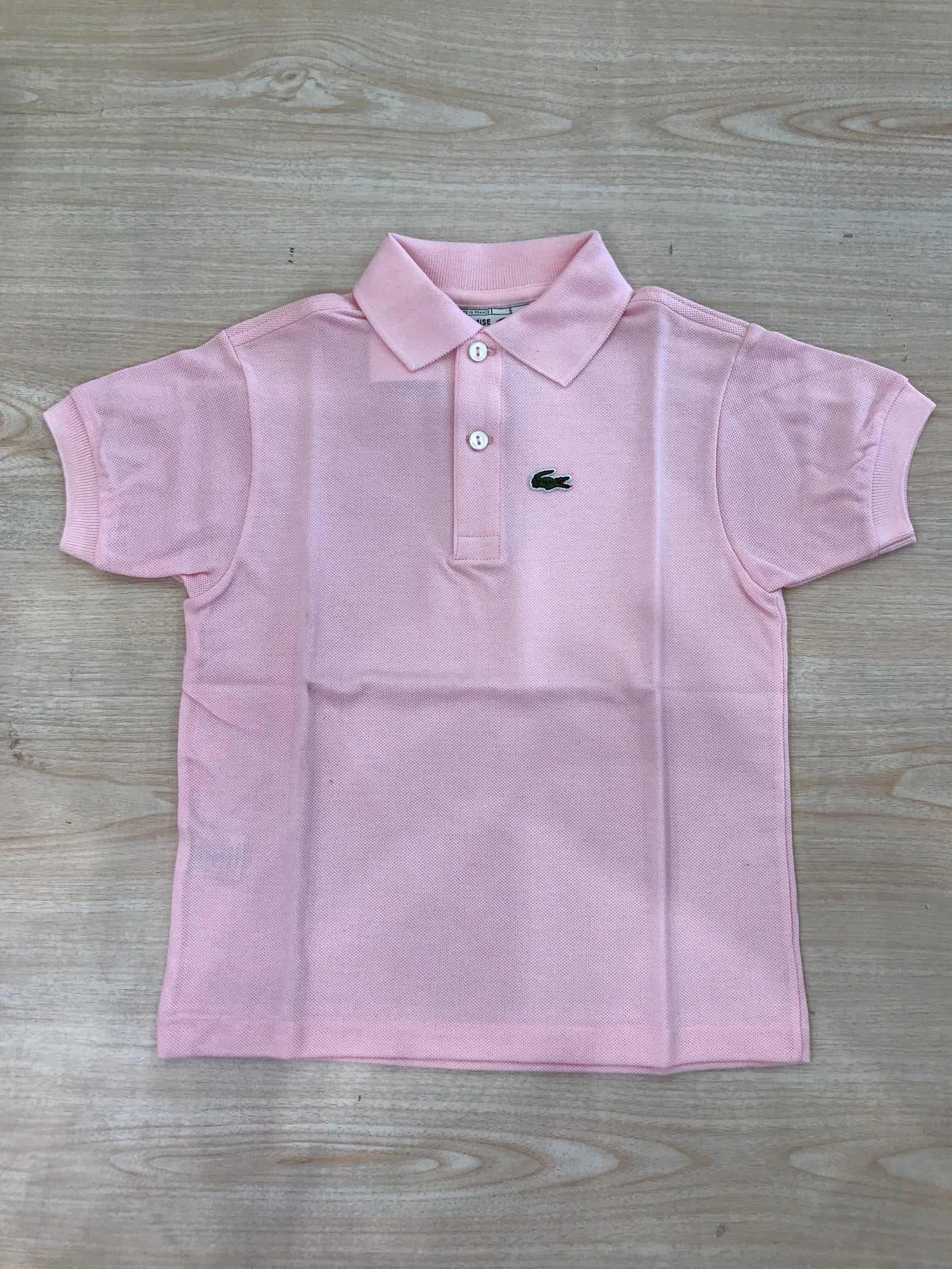 Polo Lacoste in cotone mezza manica con bottoncini e logo ricamato lateralmente unisex