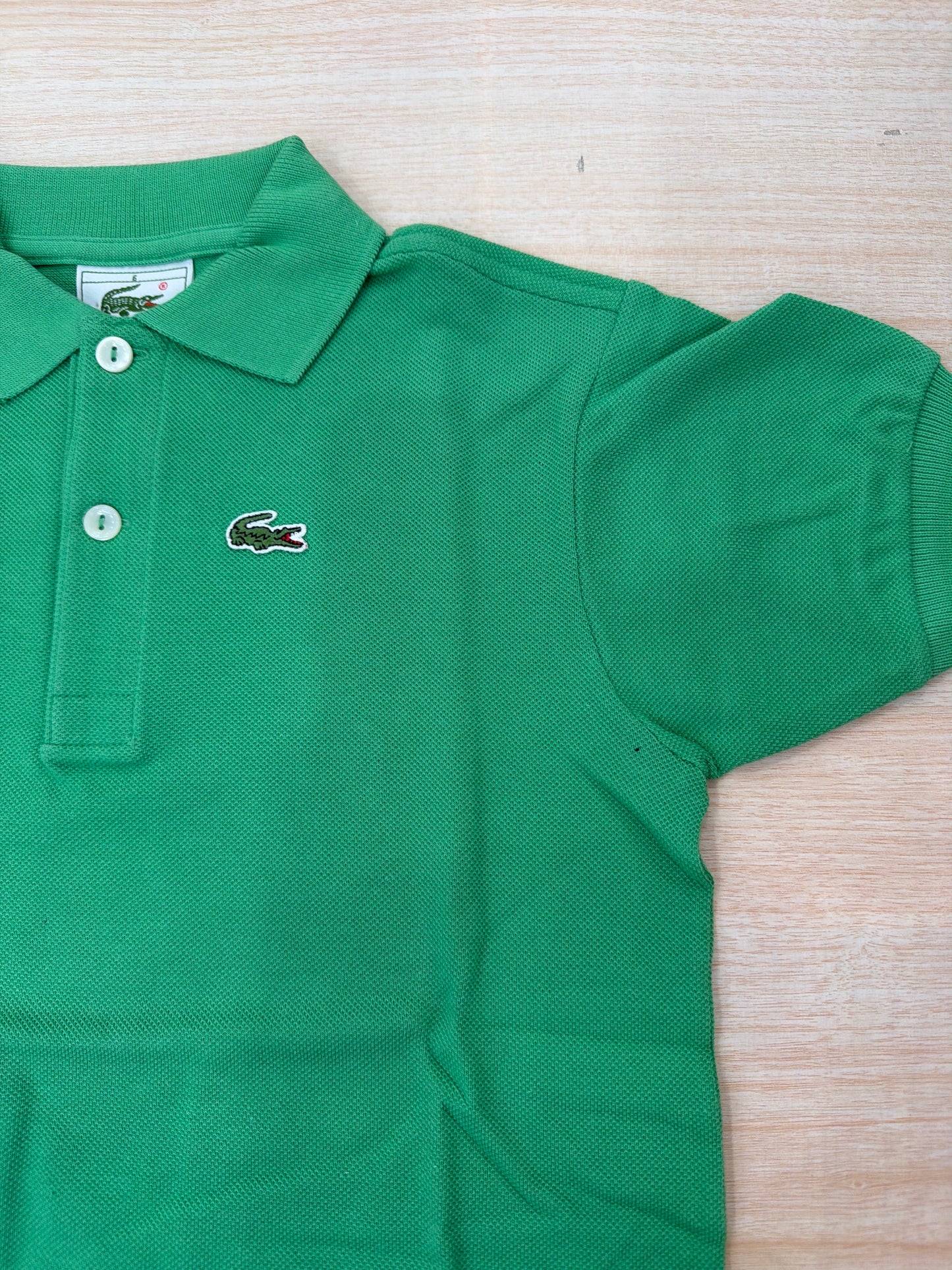Polo Lacoste in cotone mezza manica con bottoncini e logo ricamato lateralmente unisex