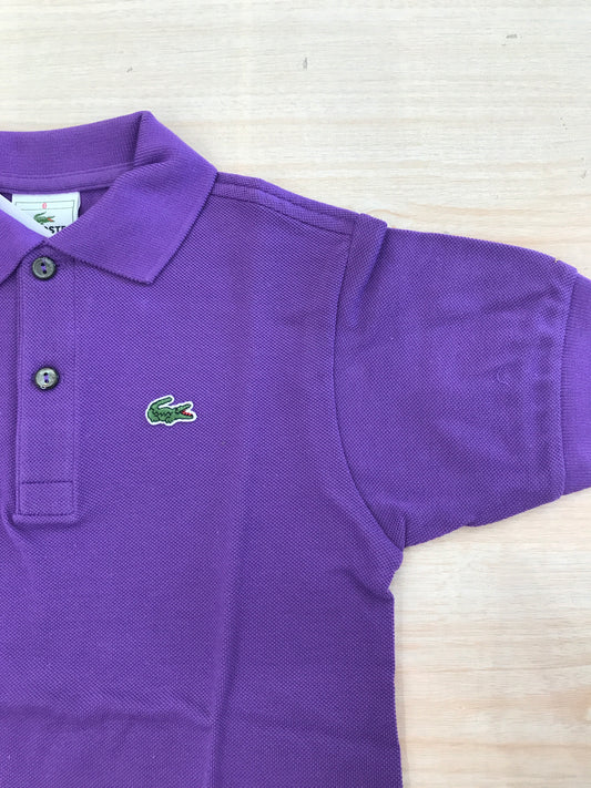 Polo Lacoste in cotone mezza manica con bottoncini e logo ricamato lateralmente unisex