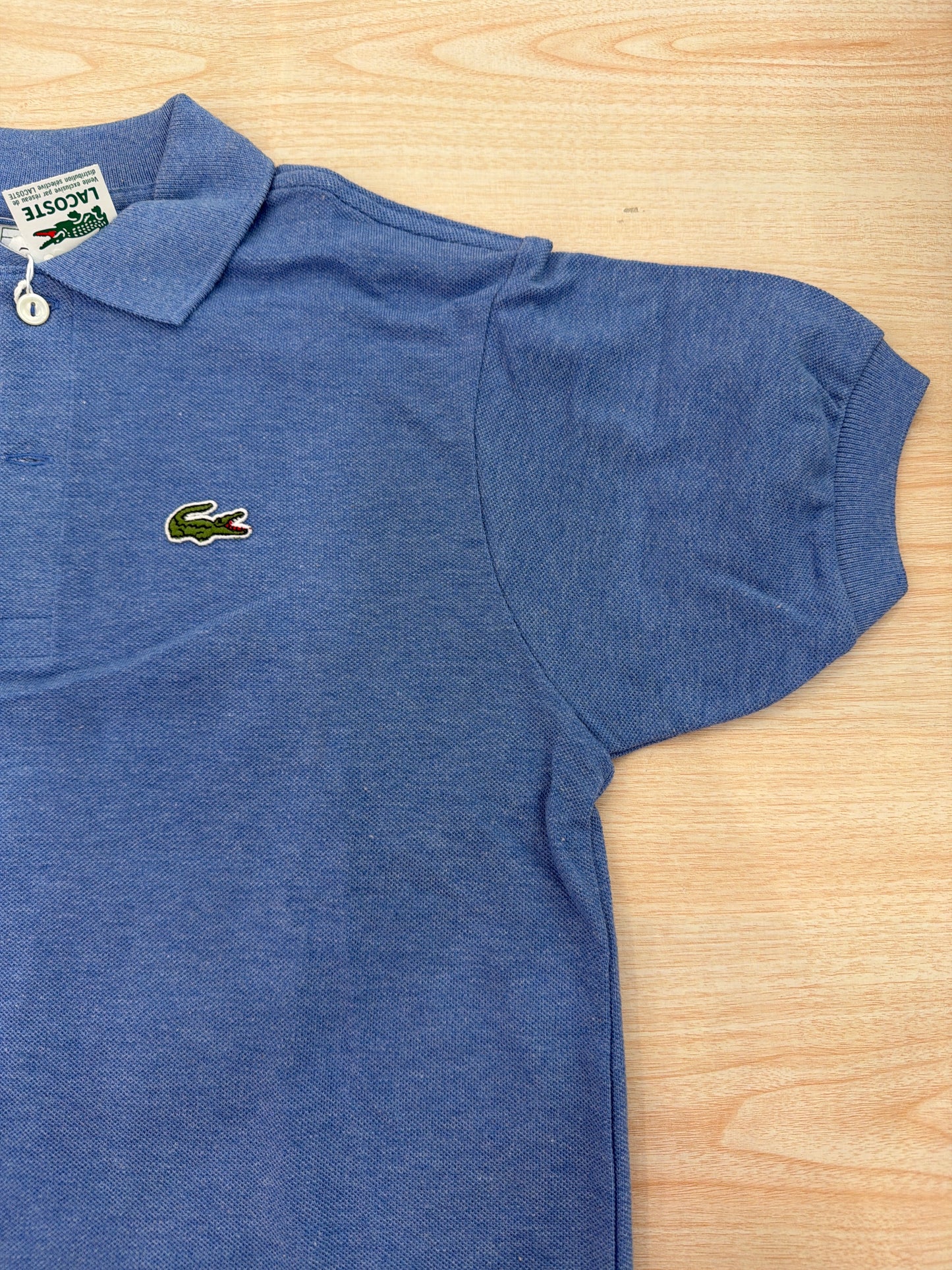 Polo Lacoste in cotone mezza manica con bottoncini e logo ricamato lateralmente unisex