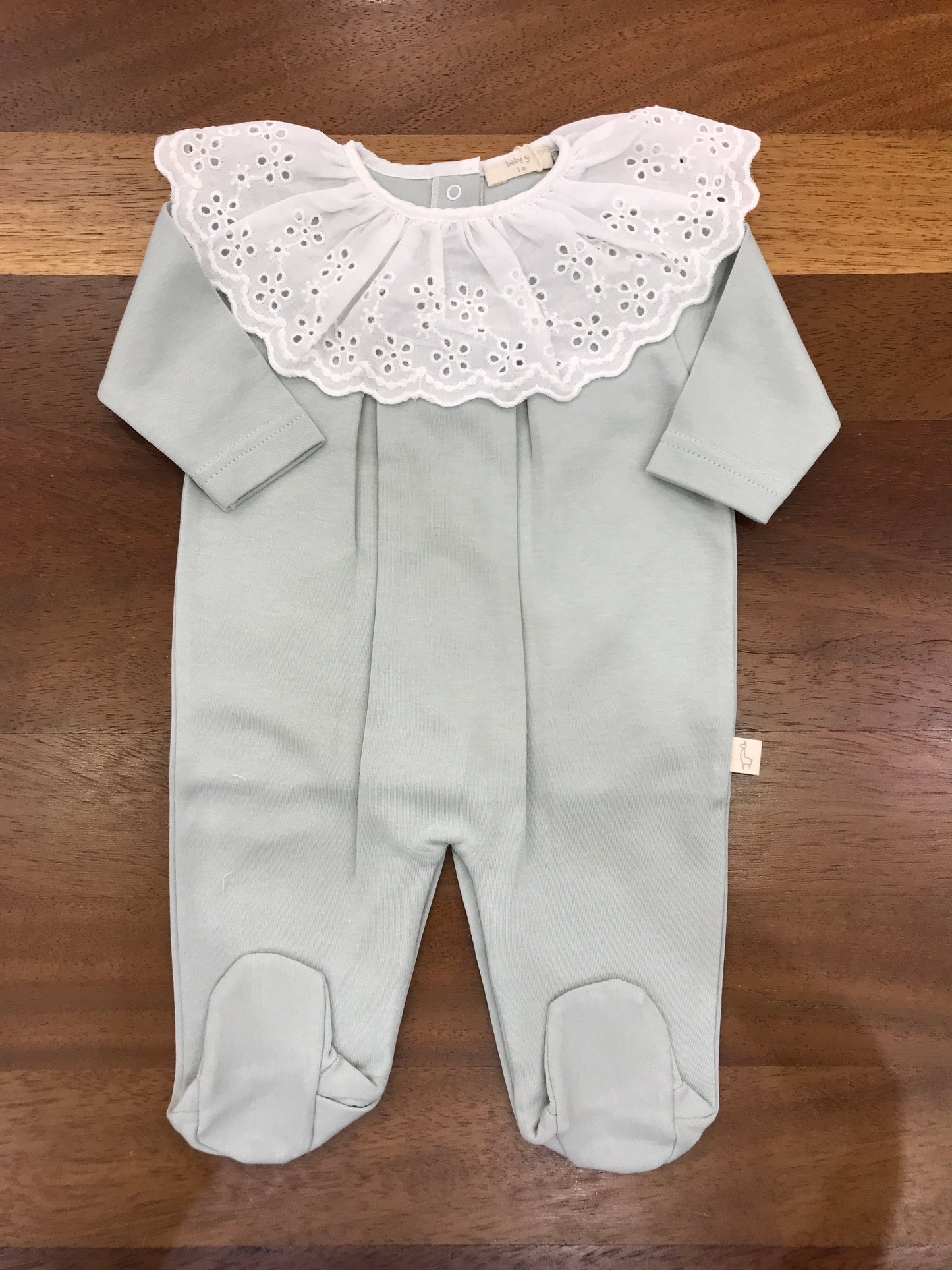 Tutina Baby Gi in cotone verde menta manica lunga gamba lunga con collo con rusche in san gallo