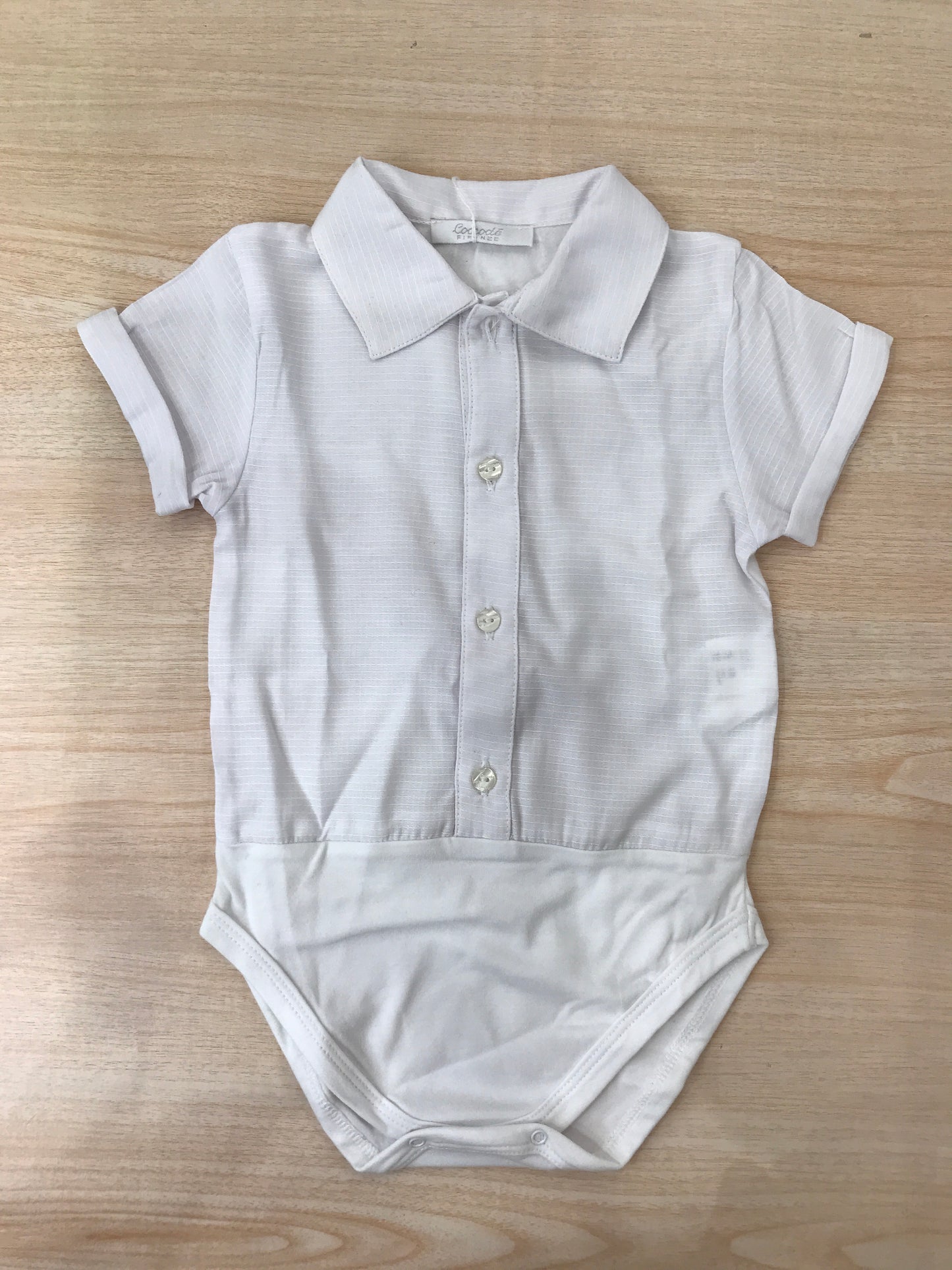 Body Coccodè in cotone mezza manica con colletto a punta con bottoncini sul davanti effetto camicia