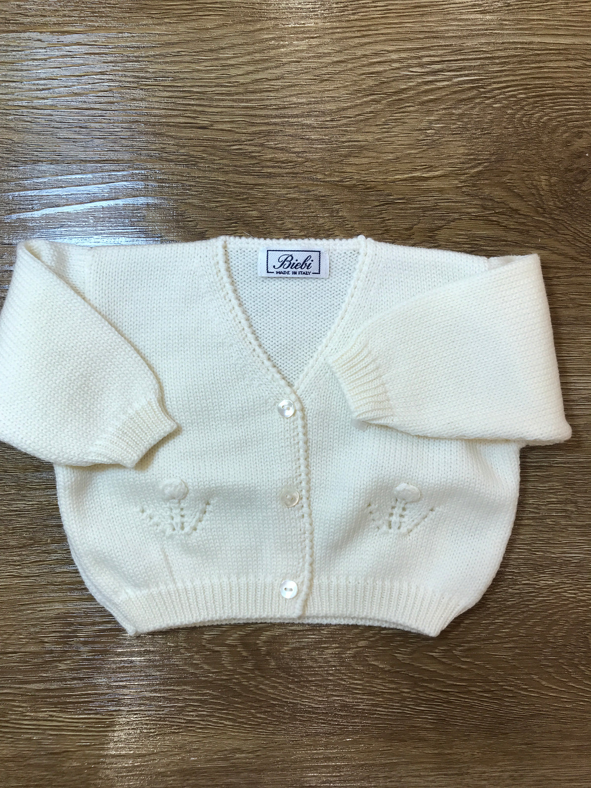 Cardigan Biebi in lana panna con piccoli bottoncini con ricamo sul davanti