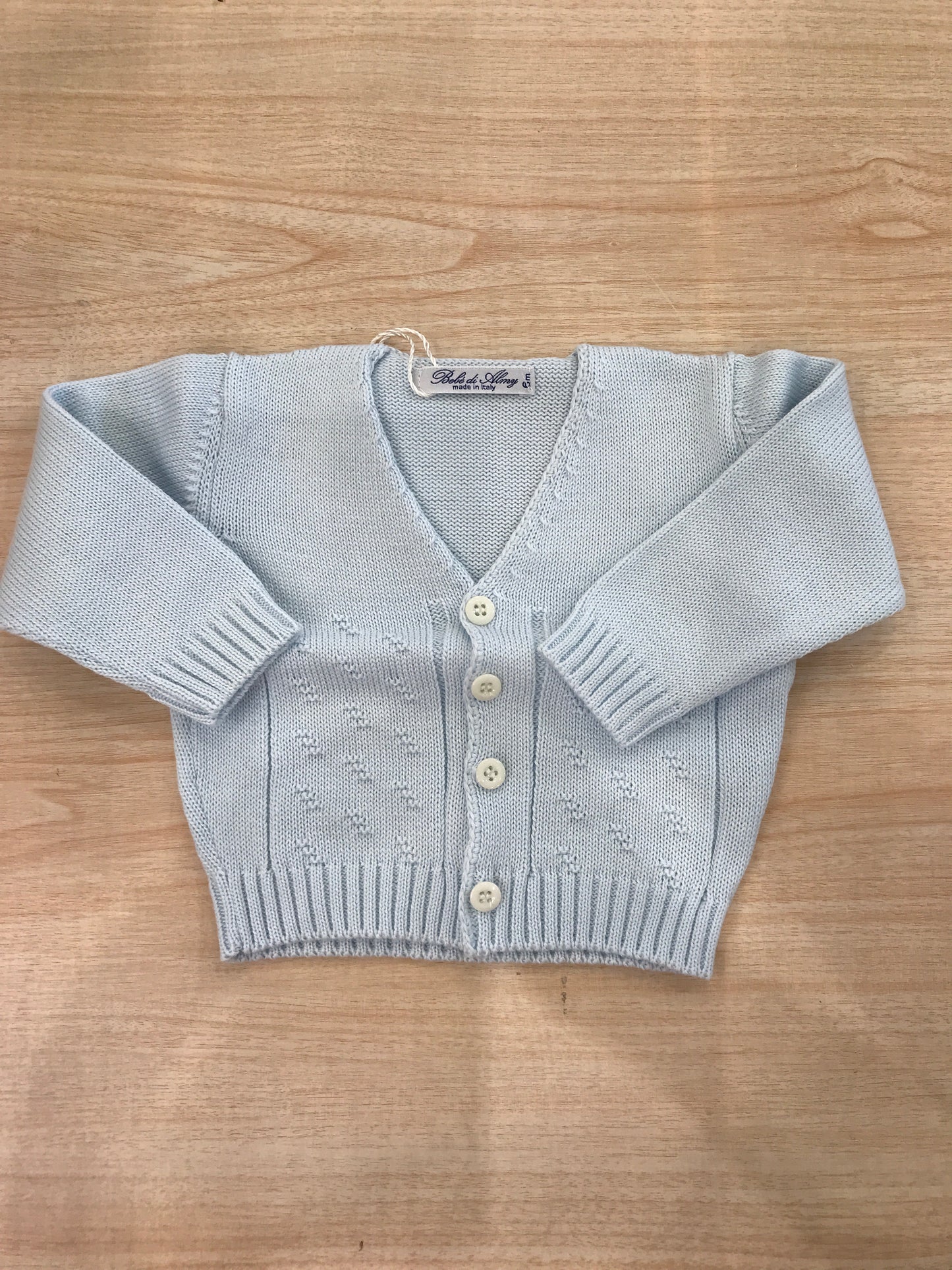 Cardigan Bebè di Almy in filo manica lunga con lavorazione sul davanti