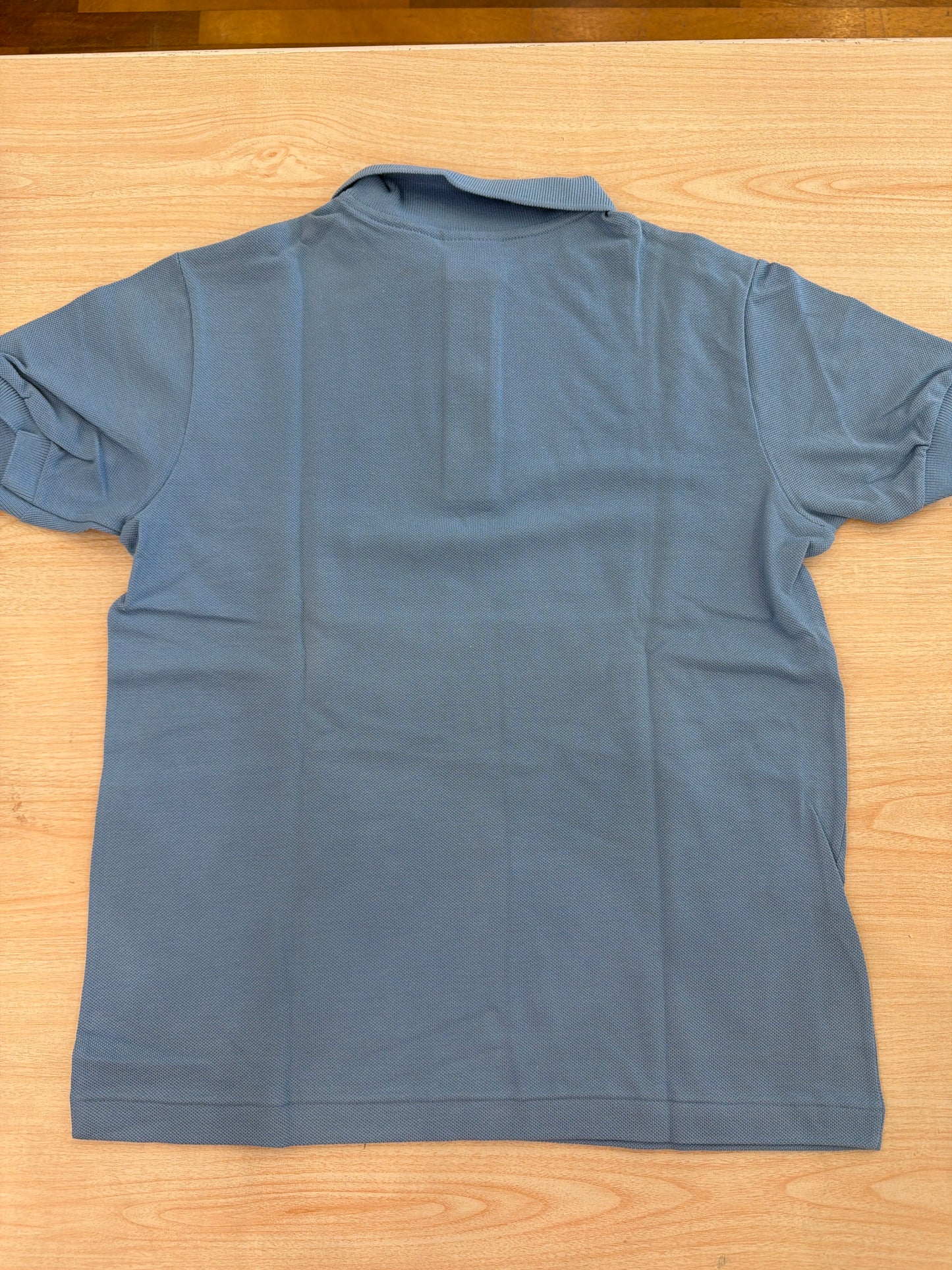 Polo Lacoste in cotone mezza manica con bottoncini e logo ricamato lateralmente unisex