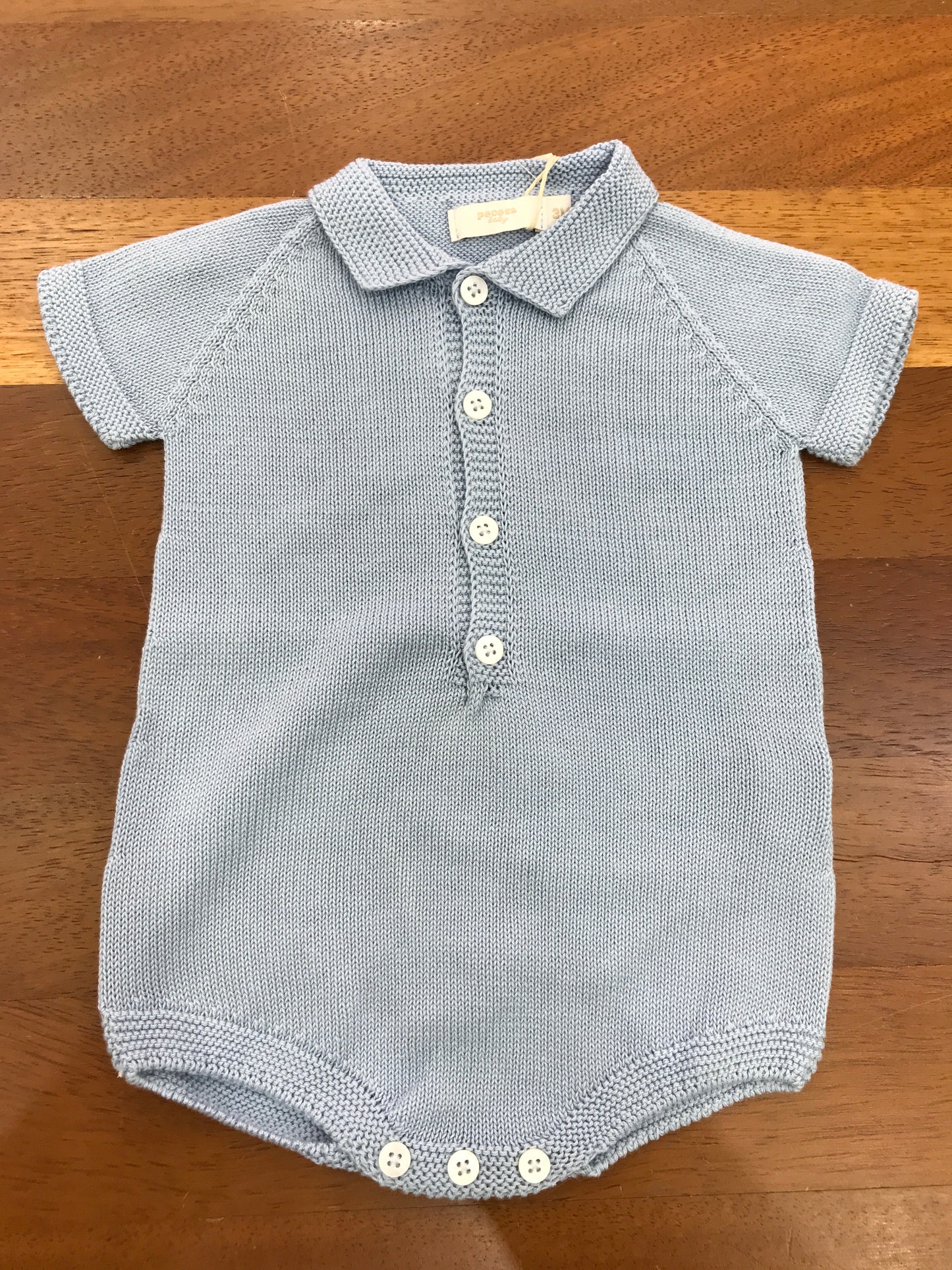 Pagliaccetto PCS in filo celeste mezza manica con collo a punta con bottoncini