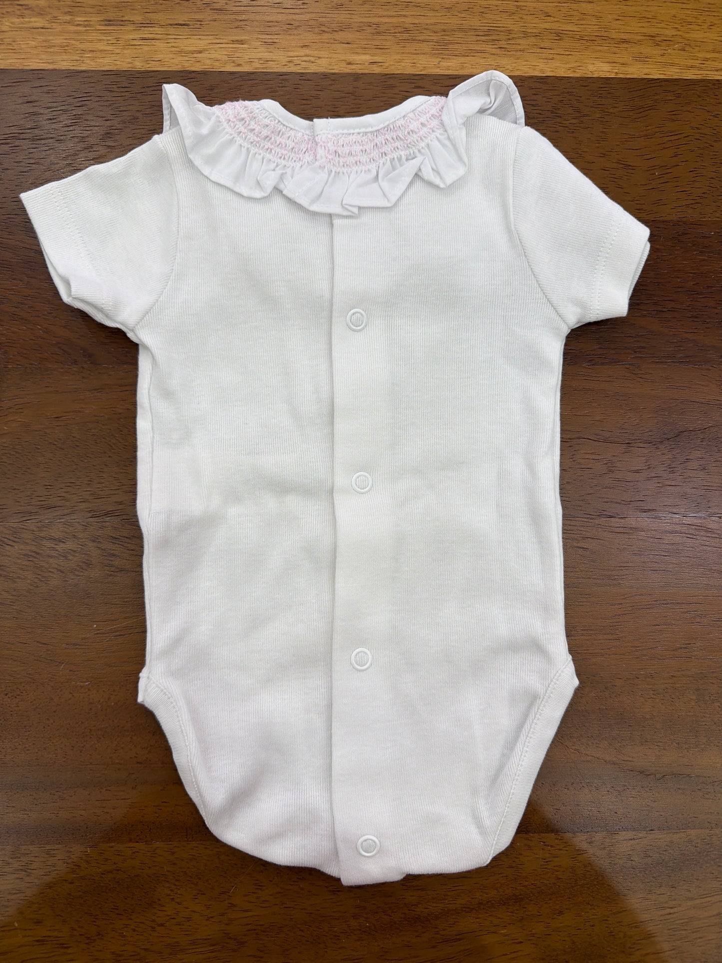 Body Martin Aranda in cotone mezza manica con collo con rusche lavorata da punto smock