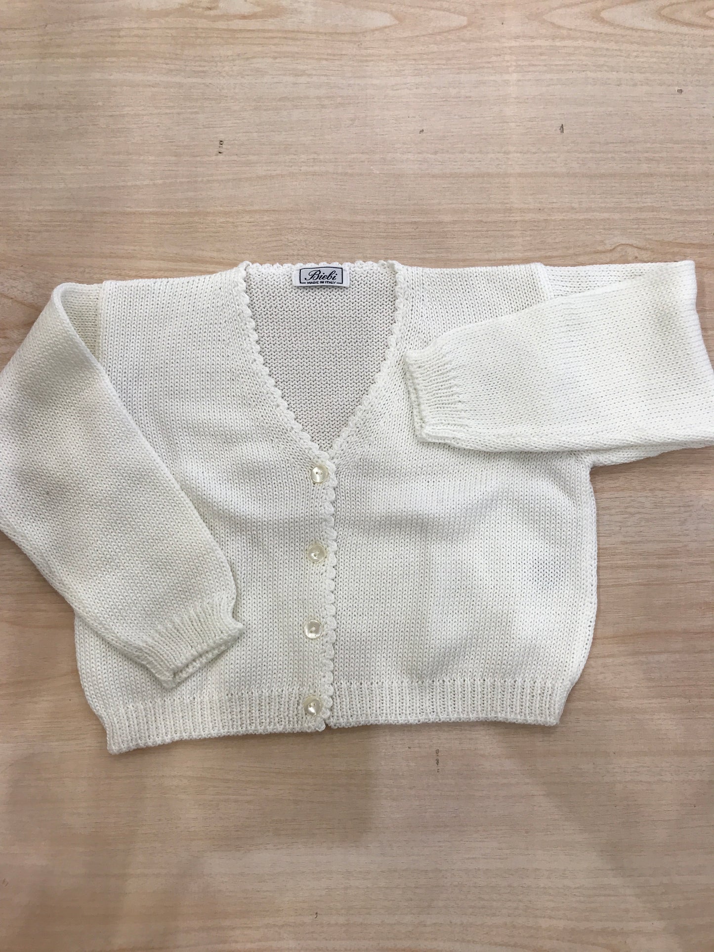 Cardigan Biebi in filo panna con bottoncini sul davanti