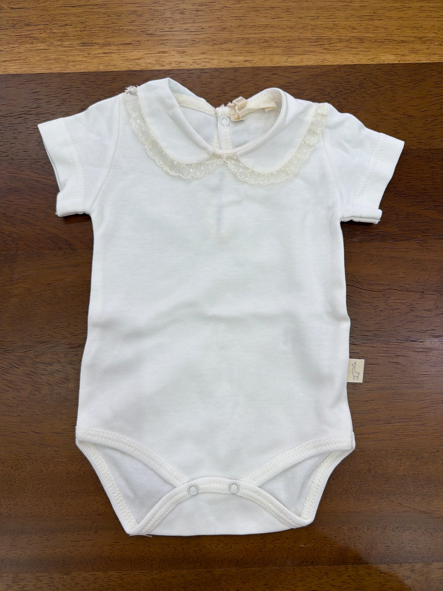 Body Baby Gi in cotone mezza manica con collo con valancienne al bordo panna
