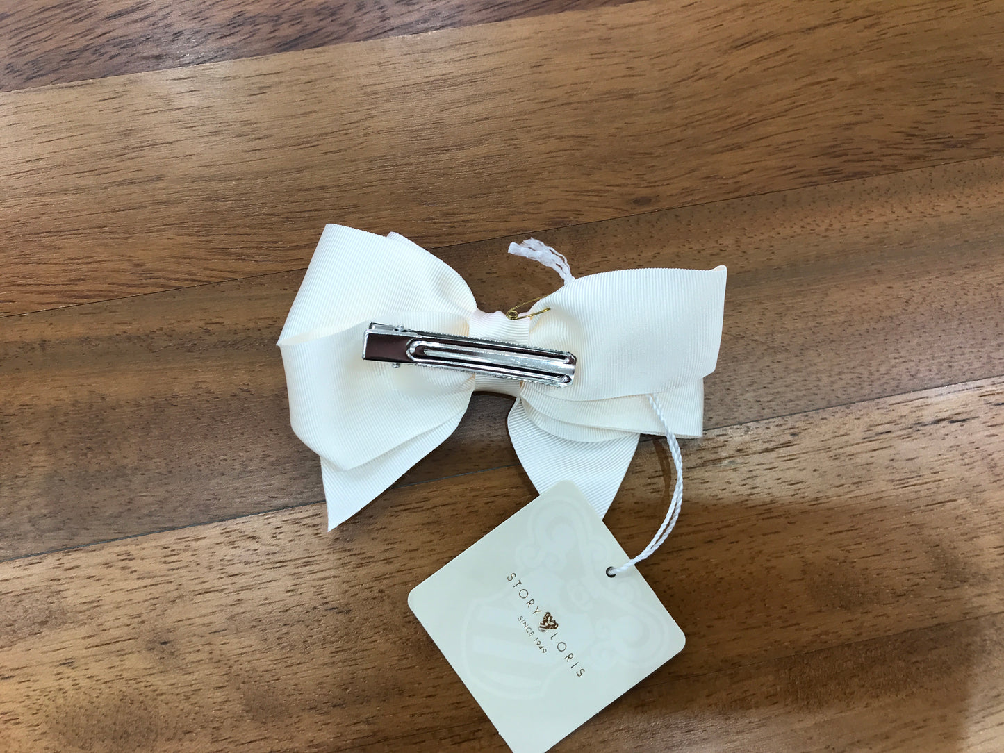 Fermaglio story Loris