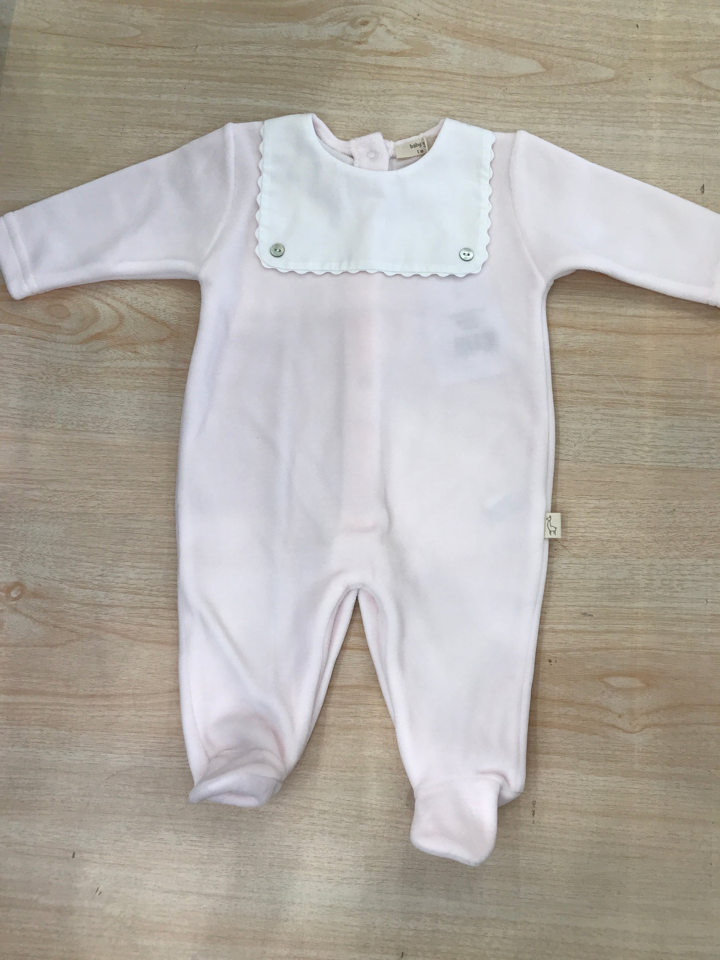 Tutina Baby Gi in ciniglia rosa intera con collo quadrato smerlato effetto bavetta