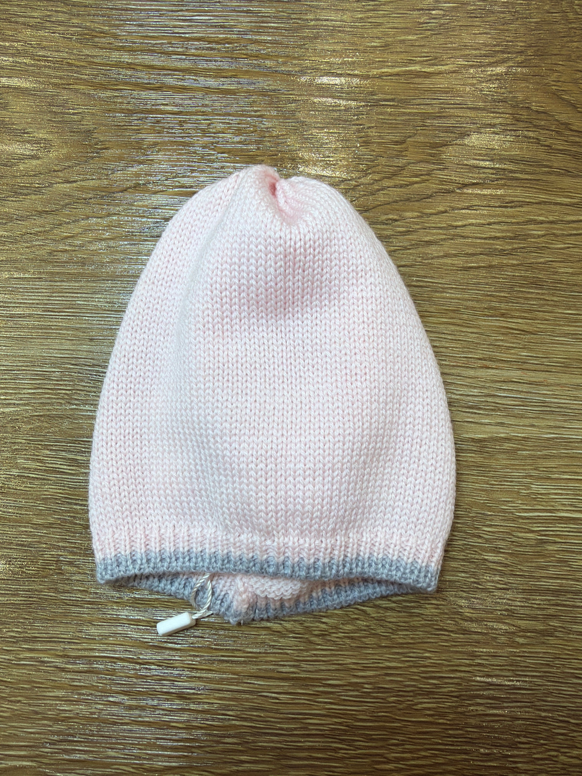 Cappello Le Dodò in lana rosa con profilo grigio