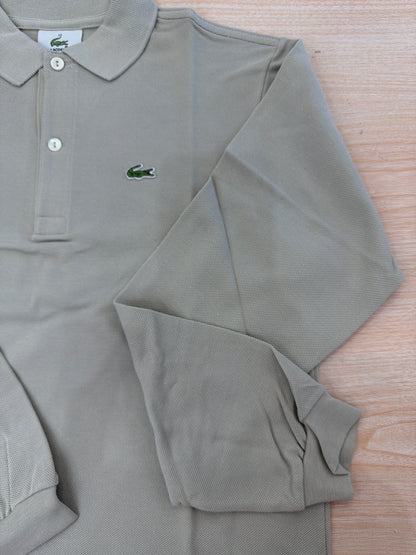 Polo Lacoste in cotone manica lunga con bottoncini e logo ricamato lateralmente unisex