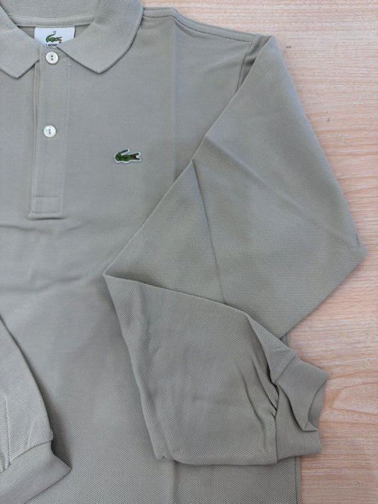 Polo Lacoste in cotone manica lunga con bottoncini e logo ricamato lateralmente unisex